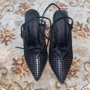Black fishnet heels
